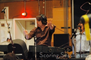 David Newman sul podio durante una registrazione